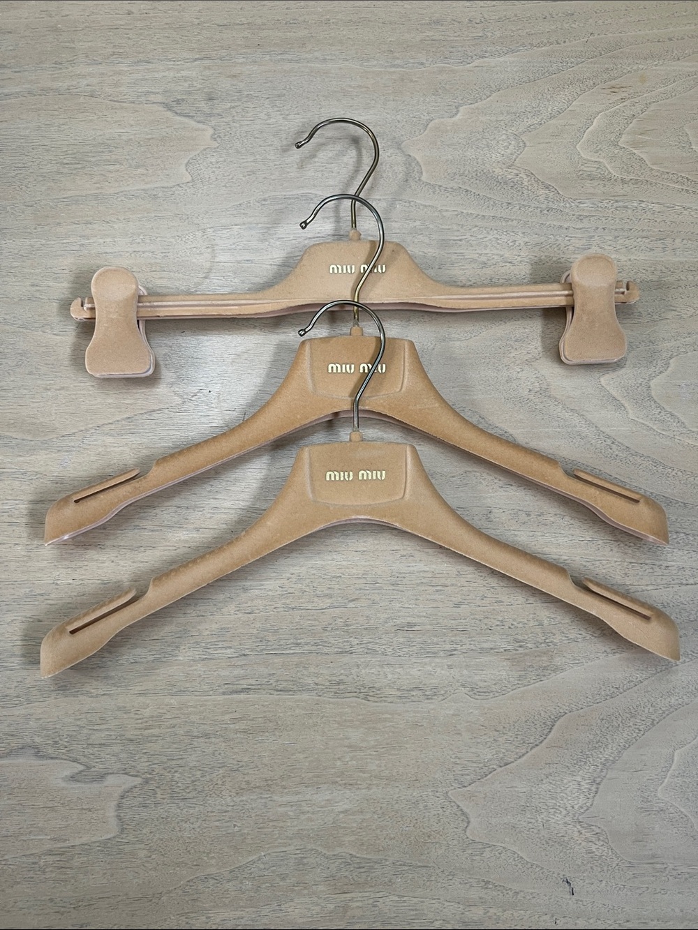 3 Miu Miu hanger